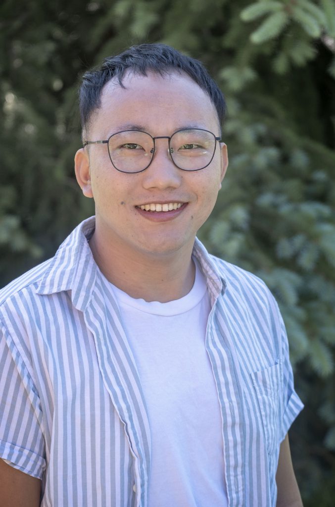Person smiles at the camera.