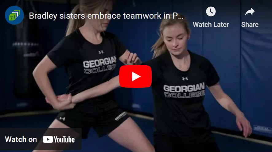 YouTube video screen grab of Emmily and Maggie working as a team to learn valuable skills through academic and practical courses at Georgian. 