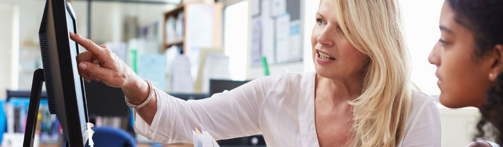 A career services advisor helps a student