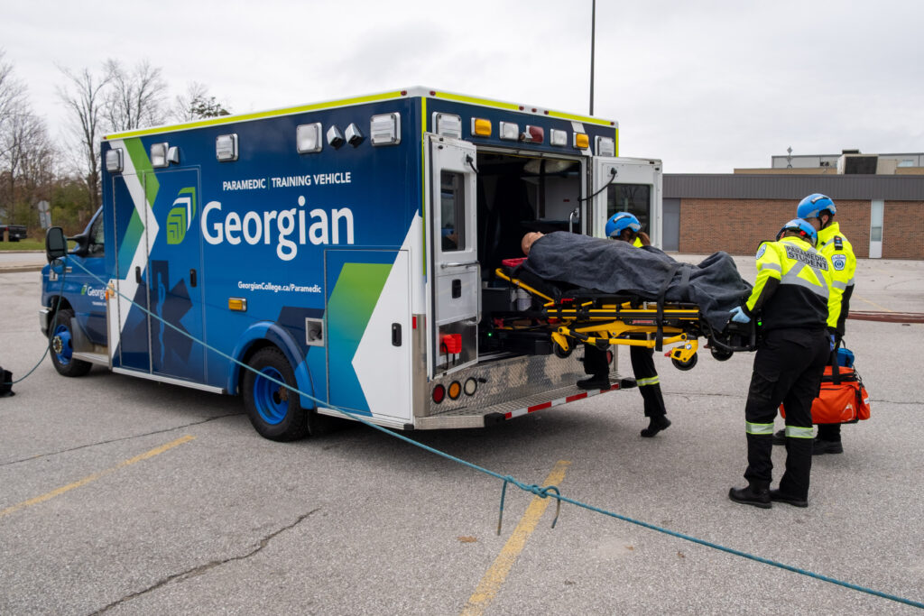 Paramedic students showcase a scenario.