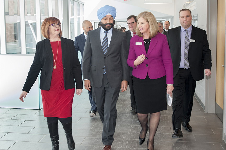 Georgian College President and CEO MaryLynn West-Moynes, third from right, tours Navdeep Bains, Minister of Innovation, Science and Economic Development, around Georgian College. Also on the tour were Ann Hoggarth, MPP Barrie, left, and Kevin Weaver, Georgian College Vice President, International, Workforce Development and Partnerships, right.