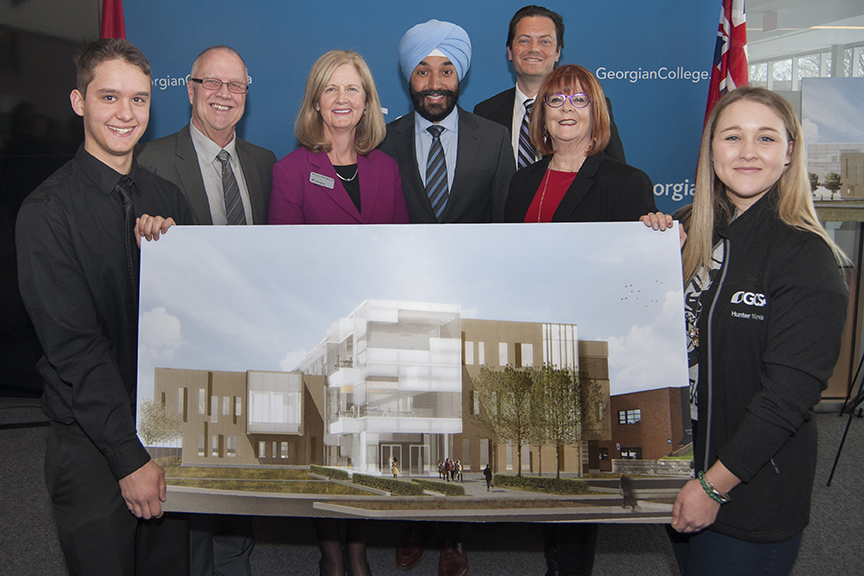 Celebrating at the announcement of federal funding for the Advanced Technology, Innovation and Research Centre at the Barrie Campus of Georgian College on Monday, Jan. 9, are, from left, Mark Reckzin, first-year Mechanical Engineering Technology student; Gerry Marshall, Warden, County of Simcoe; Georgian College past President and CEO MaryLynn West-Moynes; Navdeep Bains, Minister of Innovation, Science and Economic Development; Barrie Mayor Jeff Lehman; MPP Barrie Ann Hoggarth; and Hunter Markle, Vice President, External Relations, Student Leadership and Transition Services, Georgian College Students? Association.