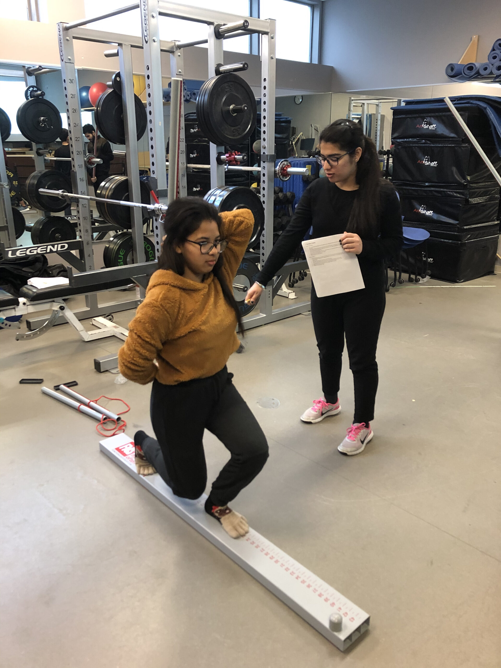 Fitness and Health Promotion students learning in their fitness lab.