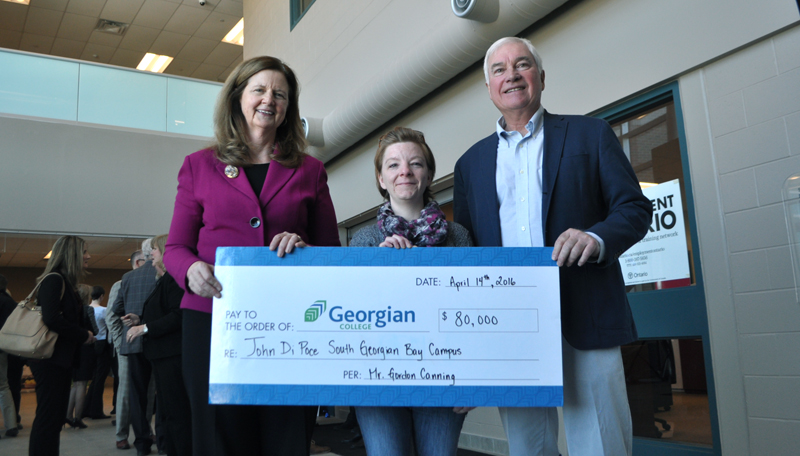 MaryLynn West-Moynes shown with Office Administration - Medical student Keitha Atkins and donor Gord Canning.