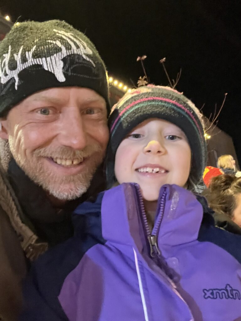 Dwight Lahay and his son enjoy some winter fun.