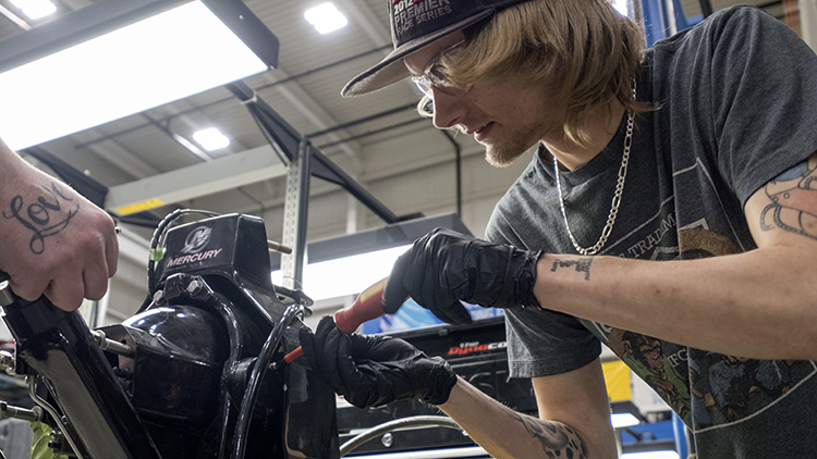 Male-Mechanical-Techniques-Small-Engine-Mechanic-student-works-on-a-project-in-Skilled-Trades-Centre