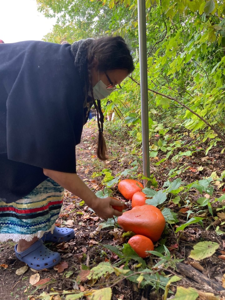 Marilyn George, Indigenous Knowledge Keeper, helped to paint and then place the stones for the Truth and Reconciliation Trail.