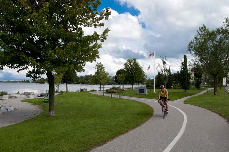 Person on a bike cycles around the Orillia lakefront 