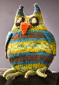 A colourful knitted owl.