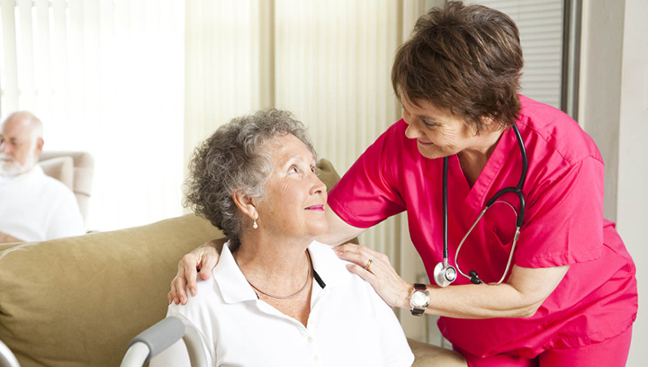 personal support worker and elderly person
