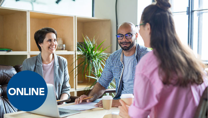 three people in an office