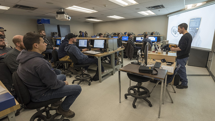 Plumbing-Techniques-instructor-Mike-Zammit-speaks-to-students-in-multimedia-classroom-at-Skilled-Trades-Centre
