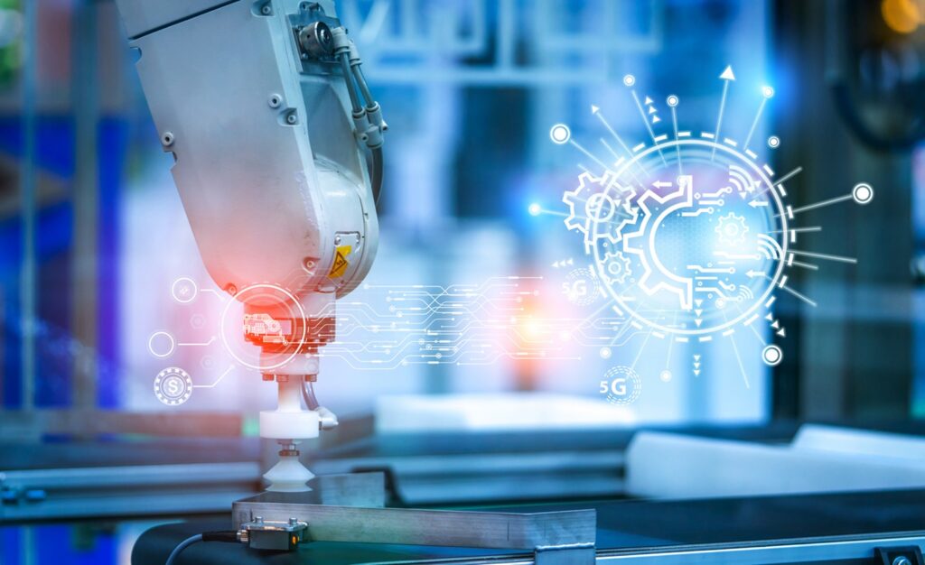 Industrial robotic arm operating over a manufacturing surface, with digital gears, circuits, connectivity symbols, and automation graphics overlaid.