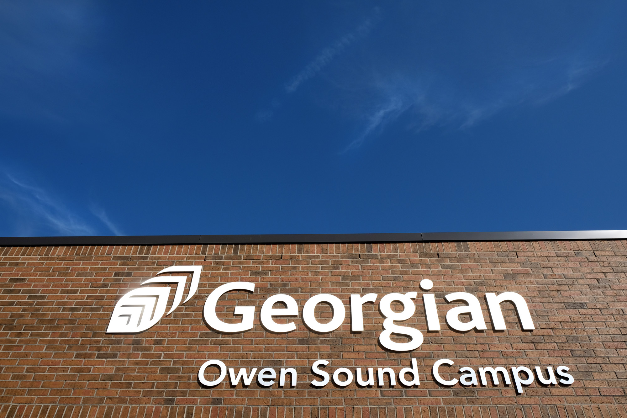 Side of building with Georgian College logo and the words Owen Sound Campus