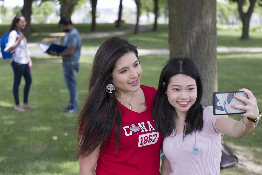 2 female students taking a selfie