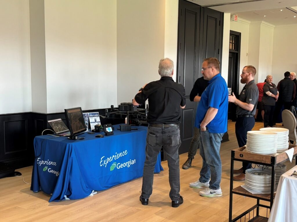 Georgian College staff explain how their drone operates.