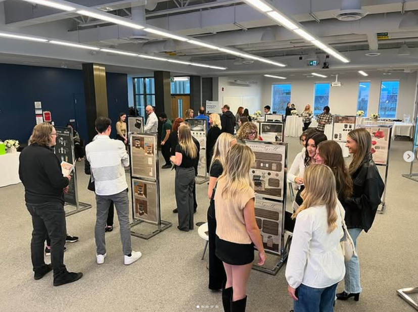 Students and Napoleon representatives reviewing submissions in the Napoleon Design Contest