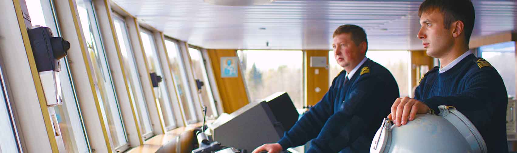 Crew on the bridge of a commercial ship