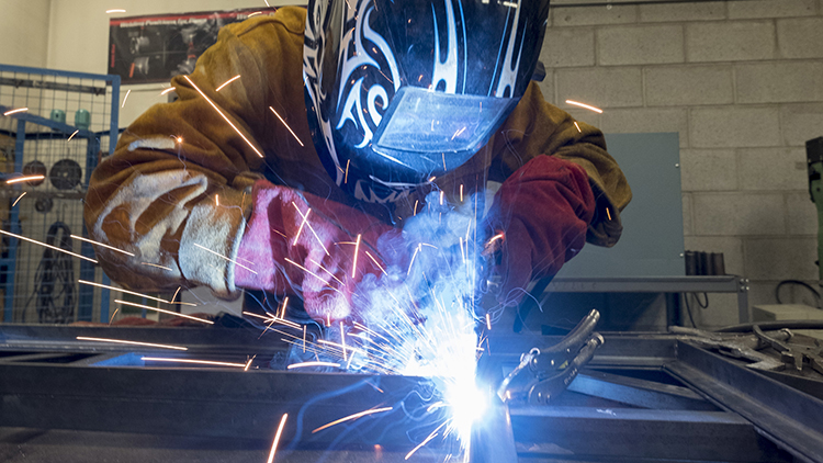 Welding student works on project in Skilled Trades Centre