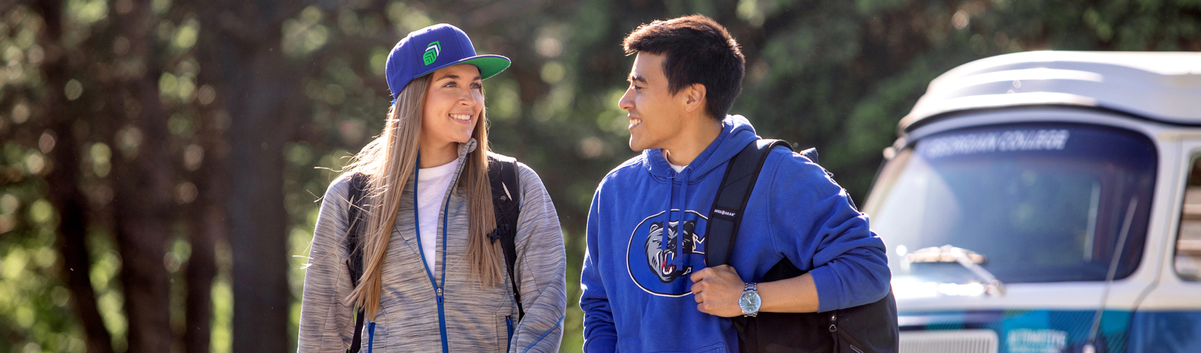 2 鶹ֱ students standing in front of