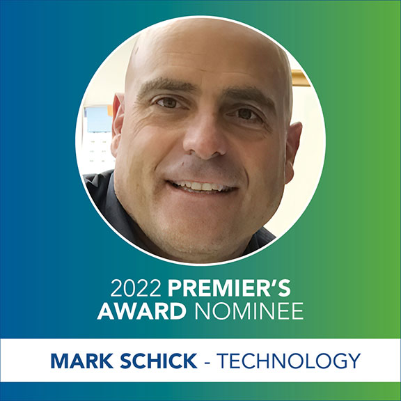 Head shot of a smiling man (Mark Schick) in a circle with the text 2022 Premier's Award Nominee