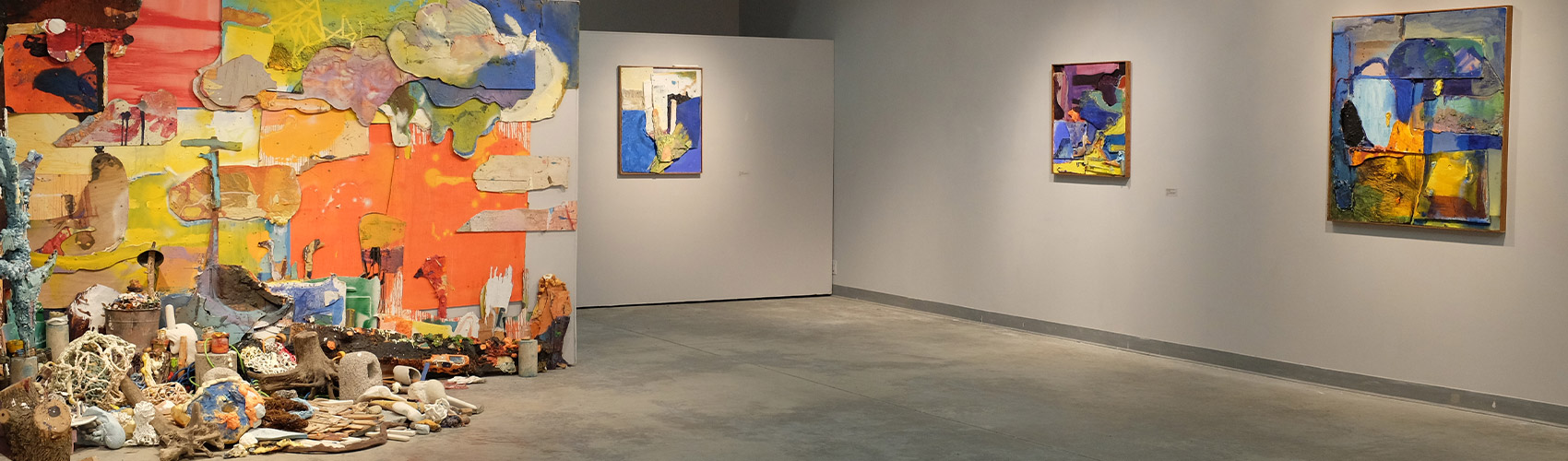 James Gardner exhibition in the Campus Gallery, featuring mosaic oil paintings on the wall and a 3D display in the corner