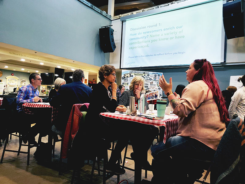 People sitting at tables in The Last Class at Georgian College Barrie Campus