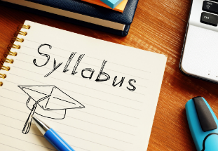 Notebook with the word Syllabus written on it.