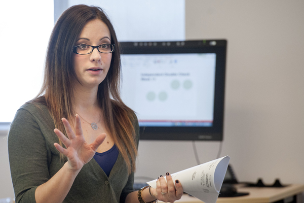 Young female presenting in a classroom