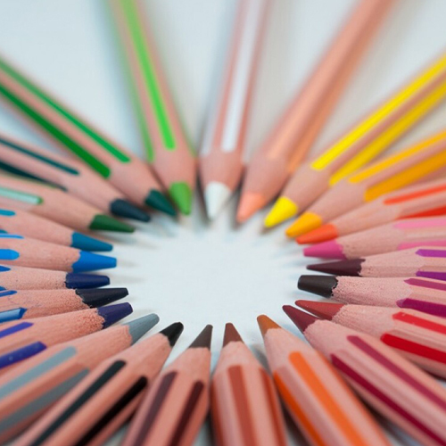 Group of colorful pencils arranged in circle 