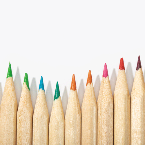 Group of colorful pencils in a row