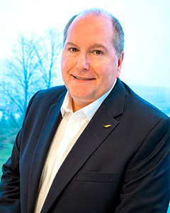 Professional headshot of David Johnson, Vice President, Finance and Corporate Services