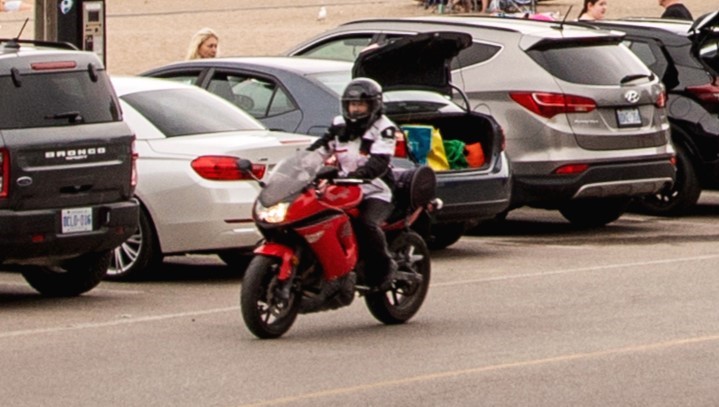 rider on beach road