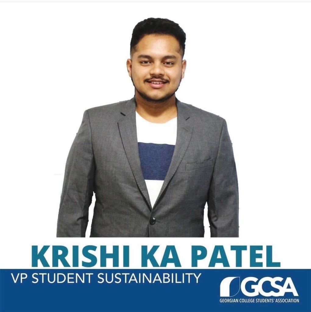 A person wearing a suit smiles. Text: Krishi Ka Patel, VP Student Sustainability GCSA