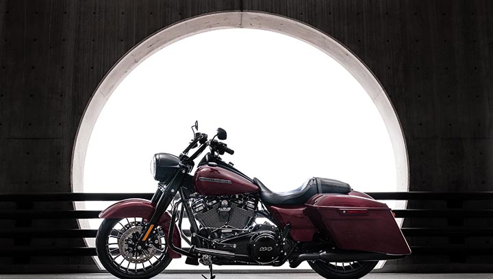 Motorcycle in front of a circle window
