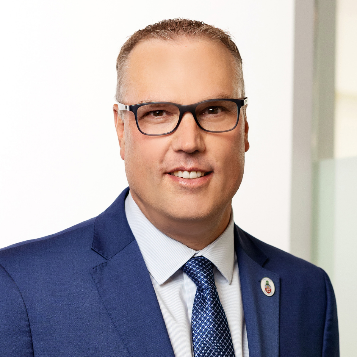 Kevin Weaver, Georgian College's new President and CEO in a suit and tie