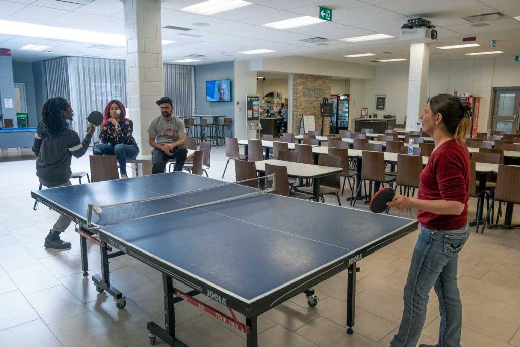 GCSA members and campus ambassadors of Georgian's Owen Sound Campus playing ping pong