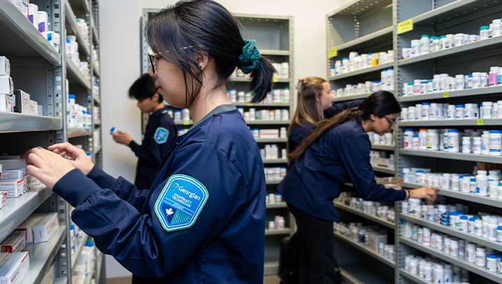 Pharmacy technician student checking a prescription