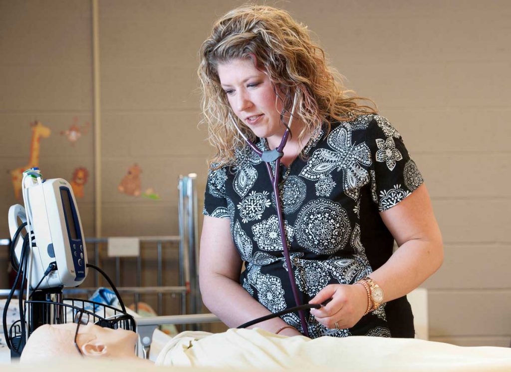 female Practical Nursing student working in the nursing simulation lab at Georgian's Owen Sound Campus