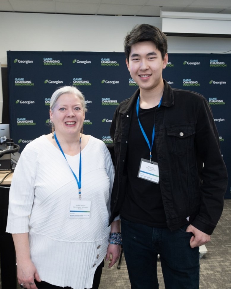 Annette Atkinson, Cabinetmaking Techniques student and recipient of the Schulich Builder Scholarship for Skilled Trades, and Andy Jiang, Heating, Refrigeration and Air Conditioning (HRAC) Technician student and fellow Schulich Builder Scholarship recipient, at the bridge-raising milestone event celebrating the expansion of Georgian’s Centre for Skilled Trades at the Barrie Campus.