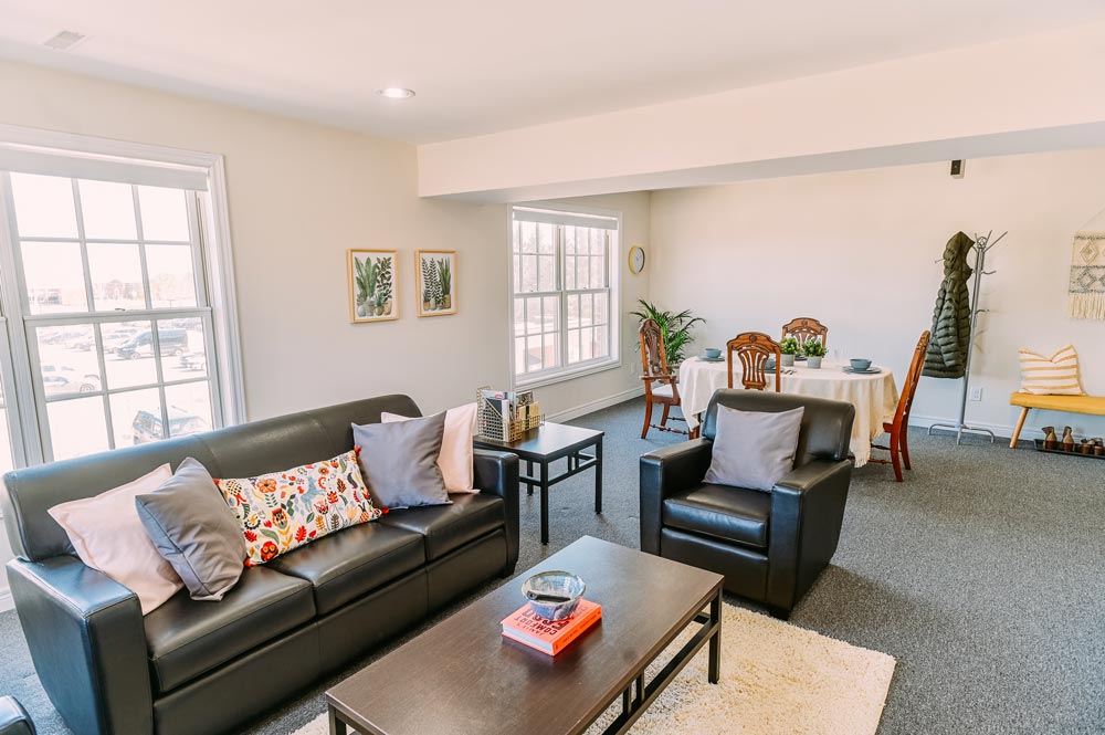 Open concept living room and dining area inside a suite at the Georgian College Orillia Residence