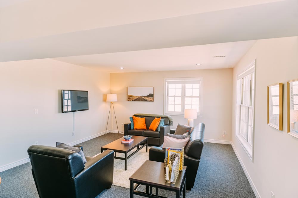 Living room area inside a student suite at the Georgian College Orillia Residence