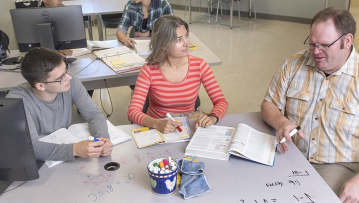 female and male student receiving help from a tutor in the Math Centre